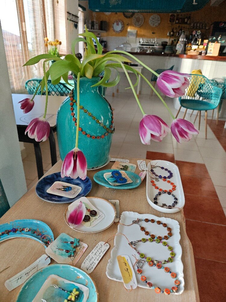 limetka pieces displayed among tulips in the café, Porto Moniz